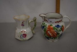 Mixed Lot: An octagonal iron stone jug together with a further 19th Century pearl ware jug with rose