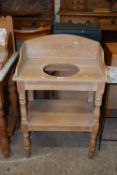 A Victorian pine wash stand, lacking central bowl
