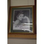 A signed photograph of Stephanie Beacham, framed and glazed