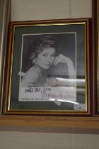 A signed photograph of Stephanie Beacham, framed and glazed