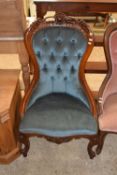 Blue upholstered Victorian style nursing chair