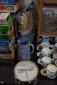 Modern wall clock, Jasper ware jug and a floral cushion (3)