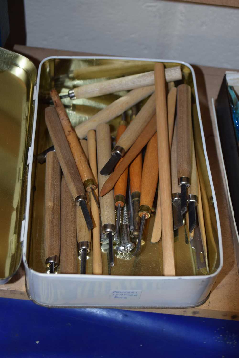 Box of various small tools for pewter and leather work