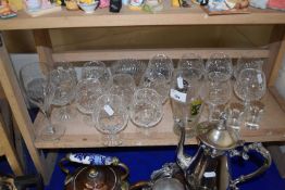 Quantity of various clear drinking glasses