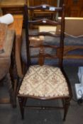 An Edwardian ladder back bedroom chair