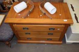 A modern pine three drawer bedroom chest