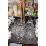 Cut glass decanter with glasses and further glass bowls