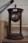 An early 20th Century hardwood cased portico type continental mantel clock