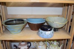 A group of various pottery bowls