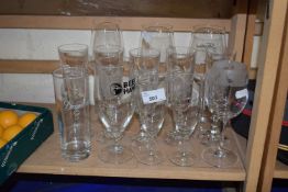 A quantity of various modern drinking glasses