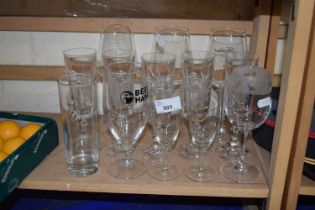 A quantity of various modern drinking glasses