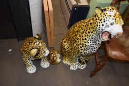 A modern pottery leopard together with two further smaller examples (3)