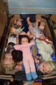 Box of various vintage dolls and doll parts, principally plastic/celluloid