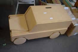 A novelty particle board blanket box formed as a Landrover together with an adjustable footstool (