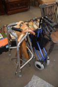 Mixed Lot: Zimmer frame, wheeled mobility walker, various walking sticks etc