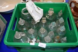 Box of clear glass chemists round bottles, mainly unlabelled