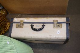 A vintage case containing a quantity of various sewing patterns
