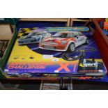 A Scalextric John Cooper Challenge box set (not checked for completeness)