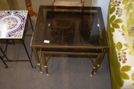 Two retro brass framed and smoked glass coffee tables
