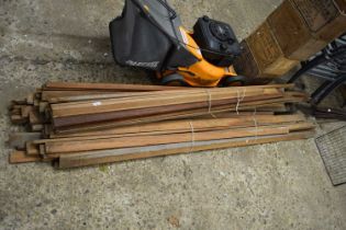 Three bundles of various length timber