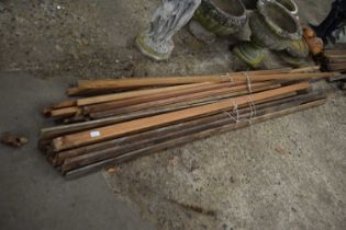 Two bundles of used timber