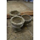 Mixed lot of planters to include a pair of urns plus one other