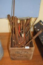 Vintage wooden crate including tools