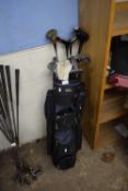 A golf bag including clubs