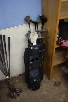 A golf bag including clubs