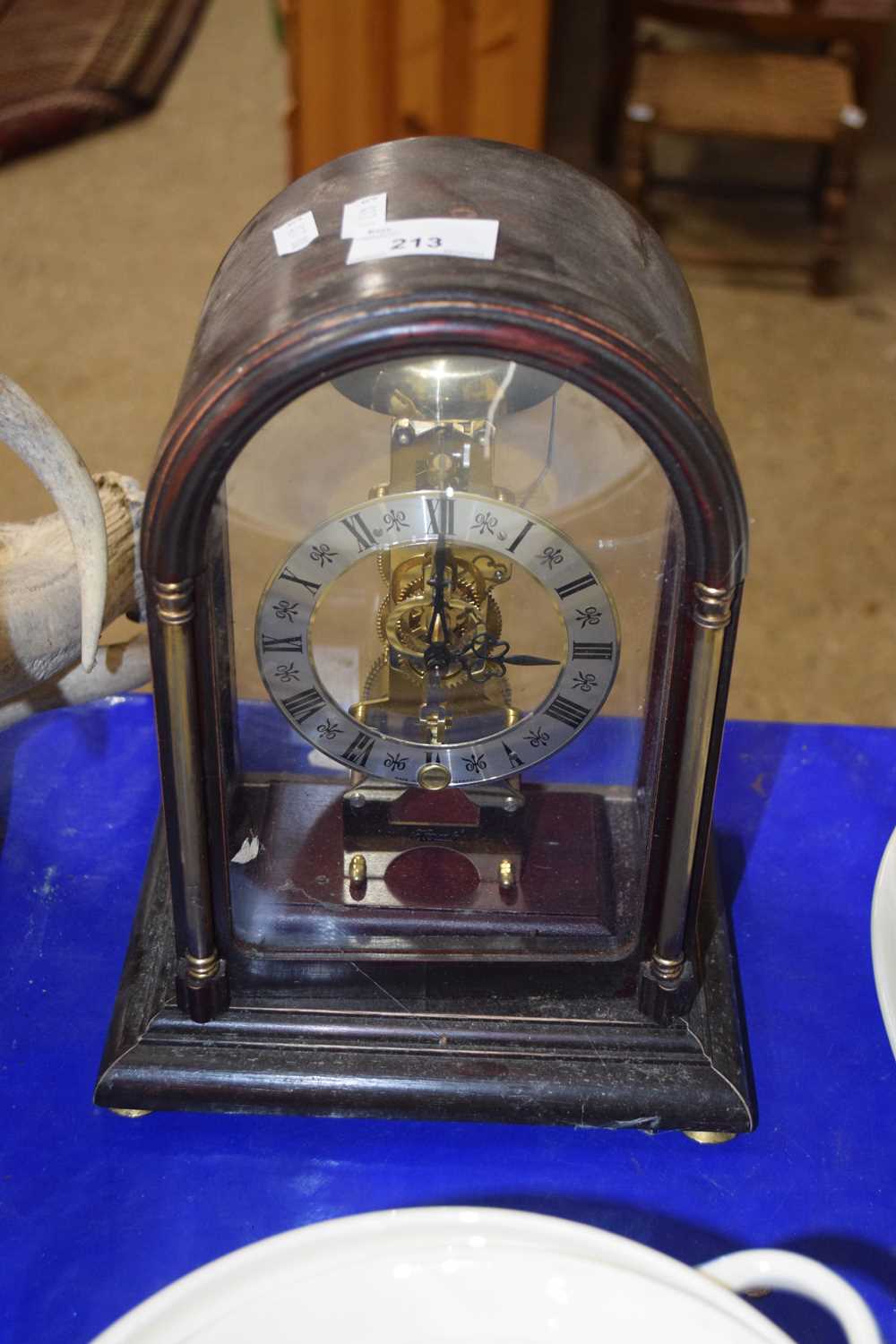 A Hermle skeleton mantel clock