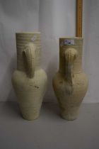 A pair of pottery jugs in the antique style