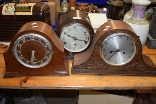 A group of three early 20th Century dome topped mantel clocks
