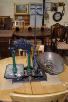 A Victorian steel and brass countertop scales with various weights