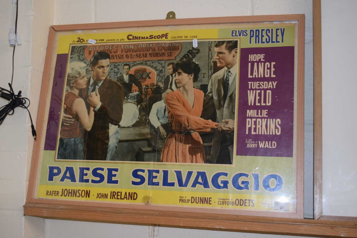 An Elvis Presley film poster Paese Selvaggio, framed