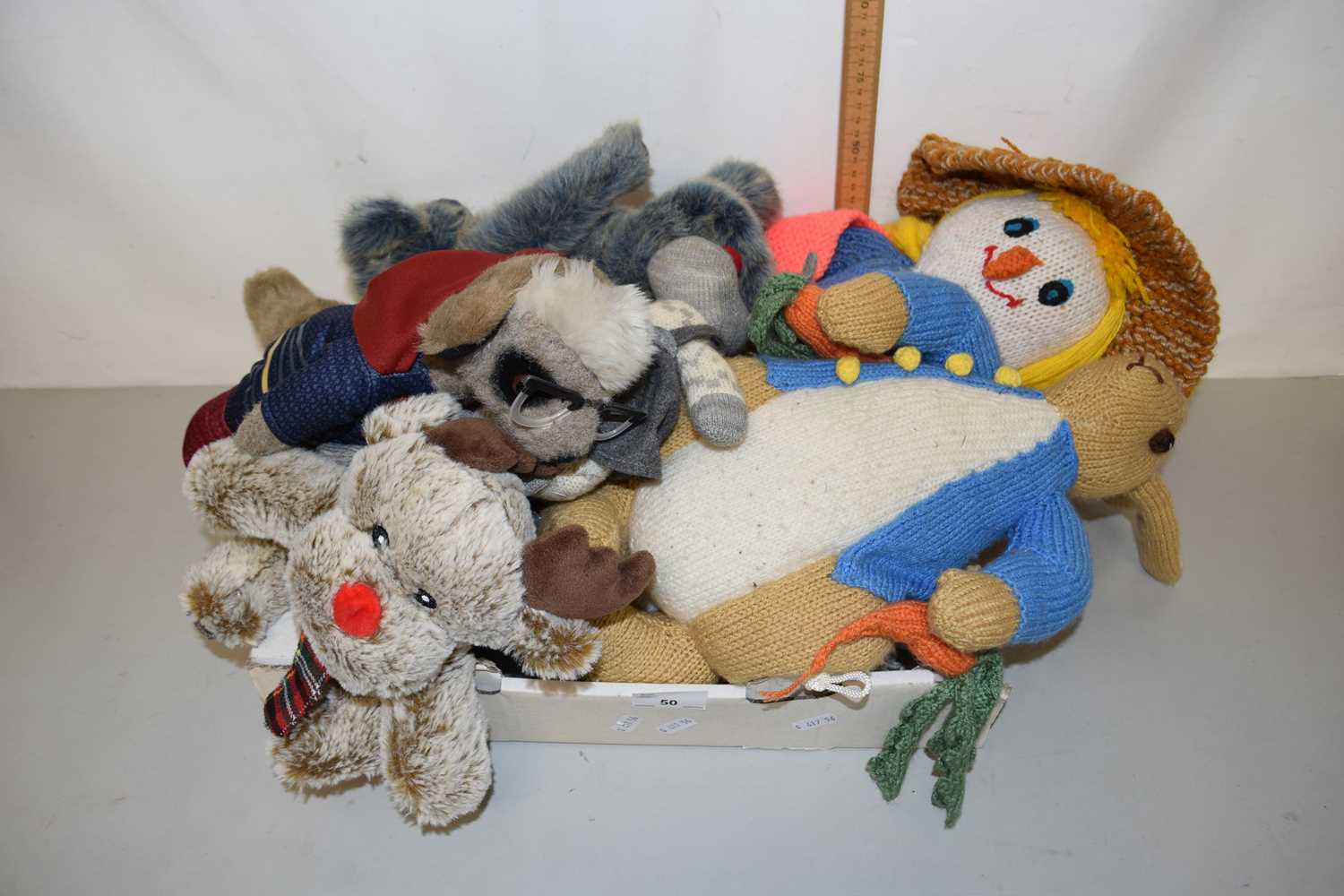 A collection of various assorted soft toys