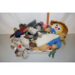 A collection of various assorted soft toys