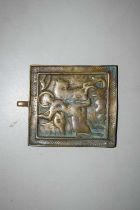 A small brass Russian icon plaque decorated with George and the Dragon