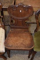 An early Victorian mahogany hall chair