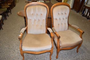 A pair of Victorian style armchairs