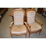 A pair of Victorian style armchairs