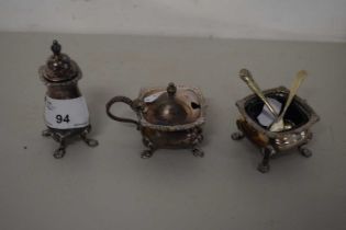 A silver plated three piece cruet