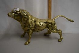 A brass model of a bull