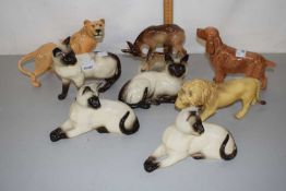 Group of ornaments to include a range of Beswick and Royal Doulton Siamese cats, a Beswick Spaniel