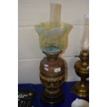 Ceramic based oil lamp with vaseline glass shade
