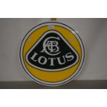 A plastic Lotus Cars sign