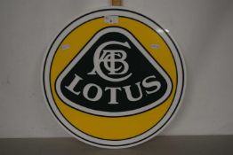 A plastic Lotus Cars sign