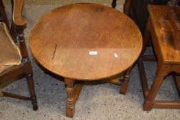 A circular oak coffee table