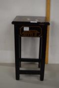 A small Oriental black lacquered single drawer table
