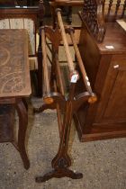 An Edwardian inlaid towel rail