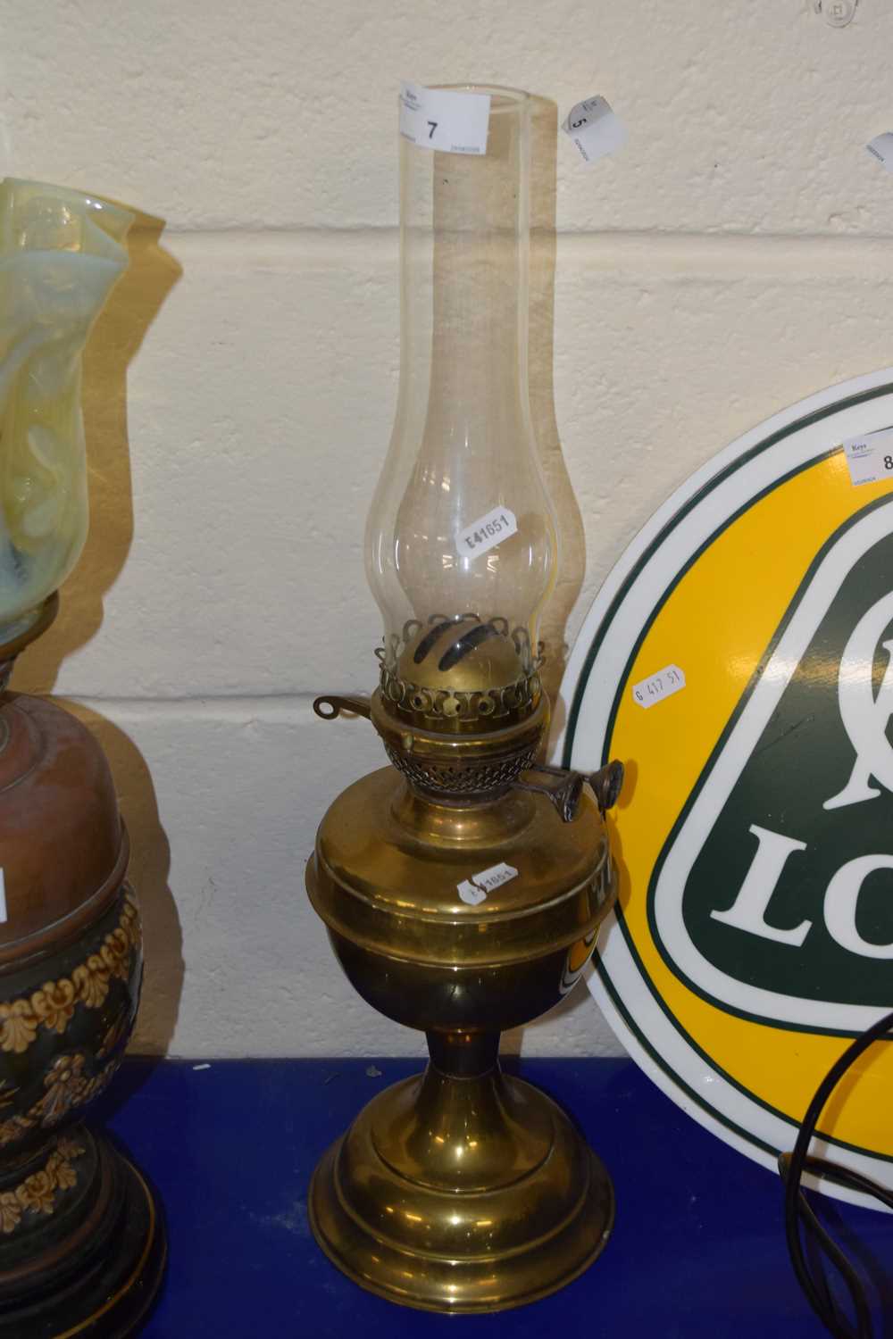 A brass based oil lamp